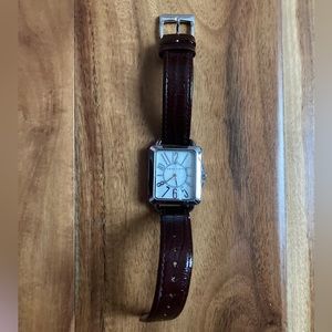 Watch with mother of pearl face.